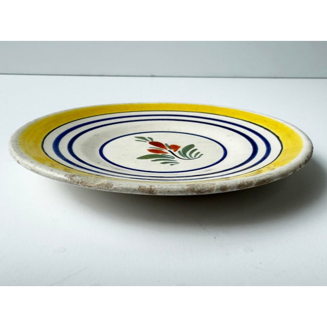 Antique plate with hand painted flower. Marked "Henriot Quimper France 729-B"