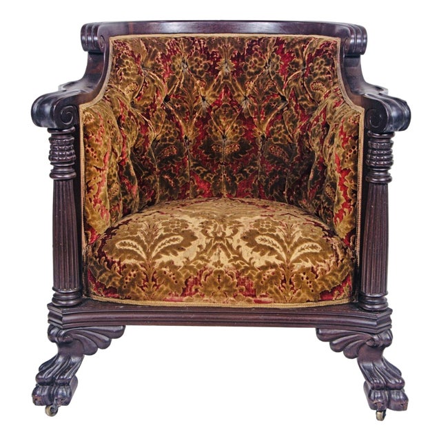 Jacobean Revival Carved Oak Armchair – Scroll Arms, Claw Feet & Figural Velvet Upholstery, C. 1920s For Sale