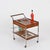Marvelous Mid-Century Italian bar trolley crafted in a refined mix of rosewood, chrome-plated metal, and white laminate....