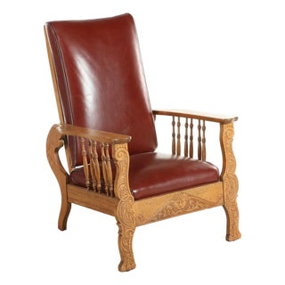 1910s S.A. Cook Upholstered Oak Recliner Chair With Carved Lion Head and Scrollwork For Sale