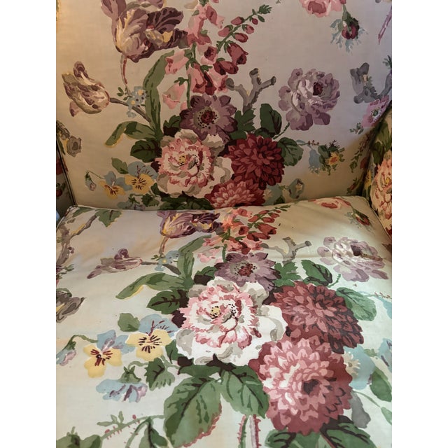 Upholstered and comfortable love seat in Brunschwig & Fils floral fabric. Perfect for a bedroom or small sitting area.