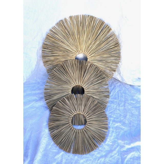 Decorative Puspa Wall Hangings in 3 sizes. Beautifully hand crafted with natural seagrass and bound together with natural...