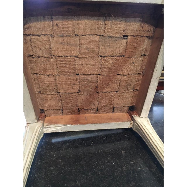 A pair of Louis XVI period chairs in their original decoration\. Reupholstered. Its square stipe legs are very rare.