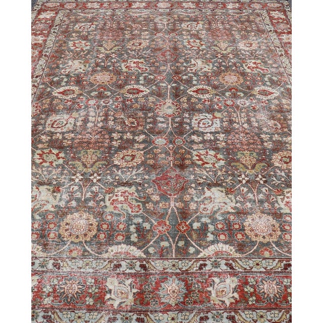 Antique Tabriz with All-Over Floral Sub-Geometric Design In Charcoal and Red. Antique Floral Tabriz, Keivan Woven Arts /...