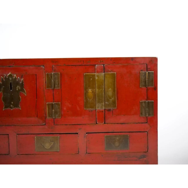 Beautiful red-lacquered Chinese sideboard / low center table was made from reclaimed pine wood with traditional nail-less...