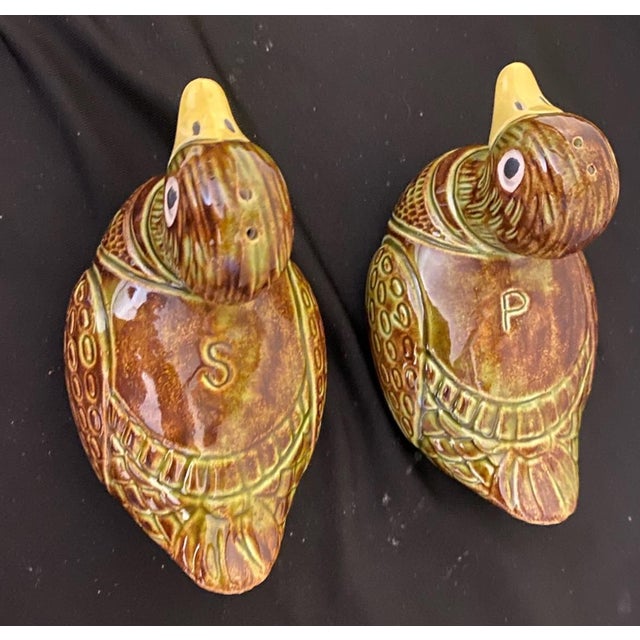 Add a touch of rustic whimsy to your table with this signed pair of ceramic duck salt and pepper shakers, crafted in the...
