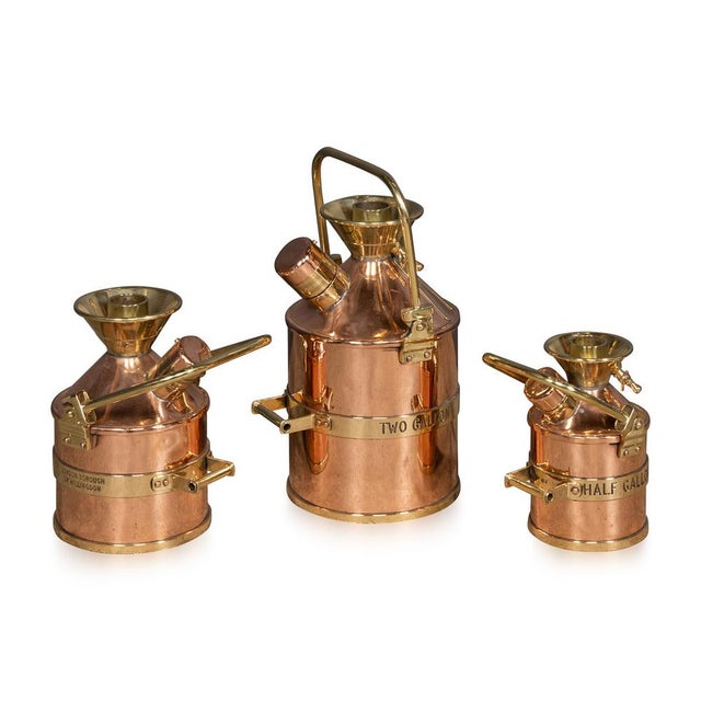 Vintage 20th Century set of three petrol measuring canisters, used by the London Borough of Hillingdon Council to check...