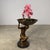 Bronze centerpiece that draws from both classical antiquity while reflecting art deco styles of the 20th century. The...