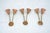 Set of three Mid-Century wall sconces in the manner of Arredoluce, featuring adjustable arms that allow for flexible...