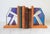 Pair of vintage wood and stained glass bookends. No makers mark. One small crack in glass. Pictured.