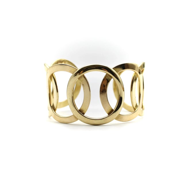 This is part of Chairish’s Fine Jewelry assortment. Reminiscent of the Olympic rings, this fabulous cuff bracelet consists...
