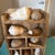 Elevate your coastal interior with this curated vintage rustic wooden shadow box shadow unit, featuring an exquisite,...