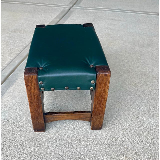 Early 20th century Arts and Crafts footstool. The stool measures about 16” x 10” x 10” tall.