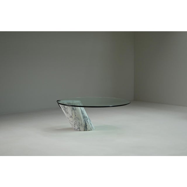 K1000 coffee table by team form ag for ronald schmitt, 1970s germany. The table combines a sculptural solid white marble...
