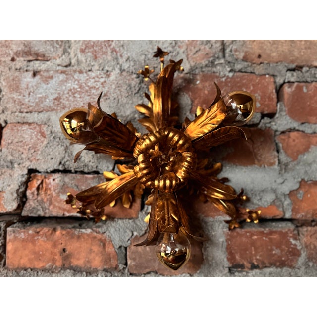 Introduce a radiant sense of history and refined style to your interior with this pair of exceptional Hans Kögl gilded...