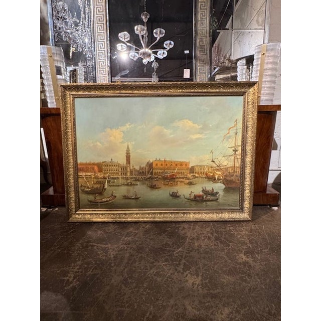 Very fine antique painting of a busy Venetian harbor. Featuring beautiful architecture, boats, and figures. A wonderful...