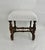 A gorgeous 19th century French Louis XIII revival period rectangular walnut stool, constructed with heavily detailed...