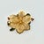 A lovely Christmas Brooch from MC Manufacturing out of New York. The brooch is from the 1960s. It features a gold-tone...