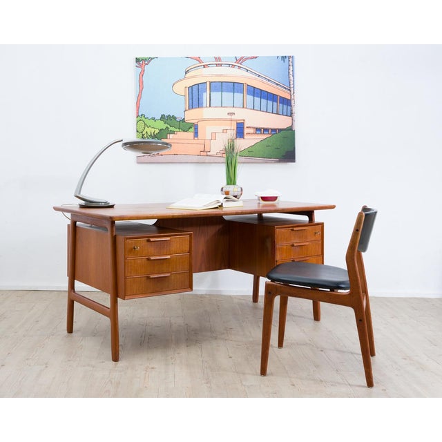 1960s omann jun model 75 desk, made in denmark. A classic, elegant desk in danish design with harmonious, organic shapes....