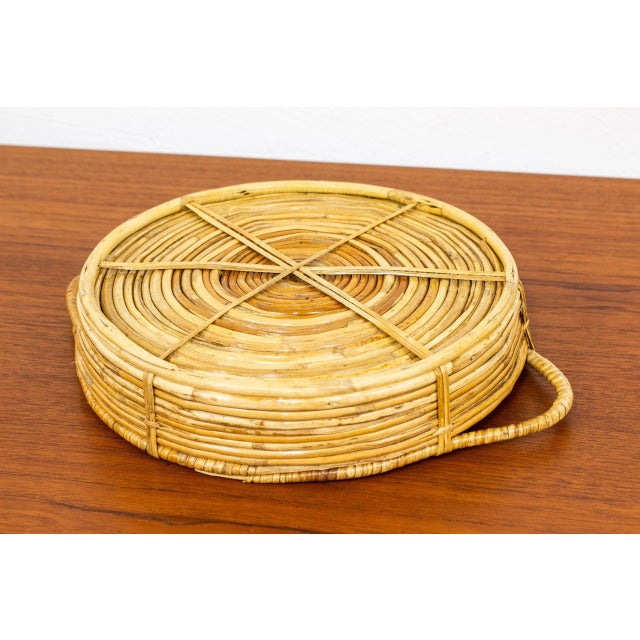 Hand woven basket or serving tray made in Finland during the 1950-60s. Hand made from cane. Very good vintage condition...