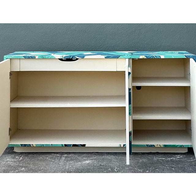 Channel the iconic glamour of the Beverly Hills Hotel and the vibrant energy of Palm Beach with this spectacular vintage...