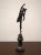 An elegant 19th-century bronze statue of Mercury, modeled after the famous Giambologna model, represents a god in dynamic...