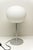 Designed by Jasper Morrison for FLOS in the 1990s, the Glo-Ball T1 Table Lamp provides soft, diffused light through a...