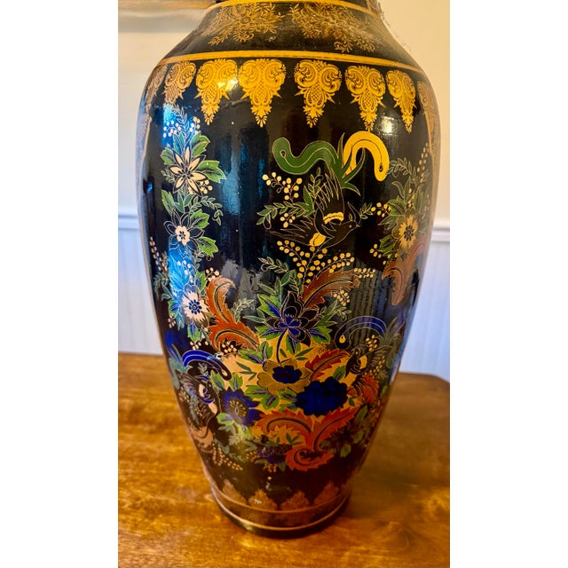 This substantial size floor vase showcases remarkable artistic skill, in its intricate use of gilt (gold) accents. Its...