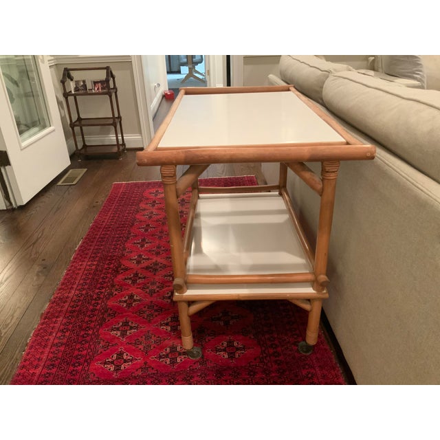 Lovely 2 tier mid century bamboo bar cart on casters This cart has ample storage to accommodate a well stocked bar....