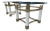 Fine pair of brass and faux ivory elephant tusk end tables, composed of twisted porcelain, heavy brass frames, and thick...