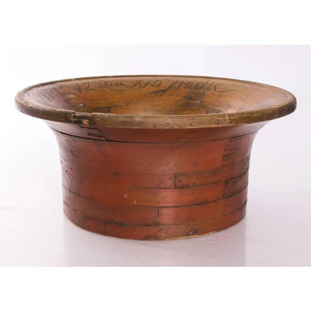 Early 20th century factory casting wooden mold in a faded, worn finish.