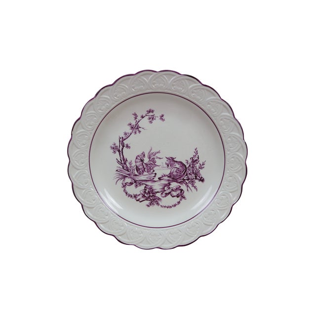 Eleven Wedgwood creamware transferware scalloped plates in the Mennecy pattern, circa 1900s. The plates features a scenic...