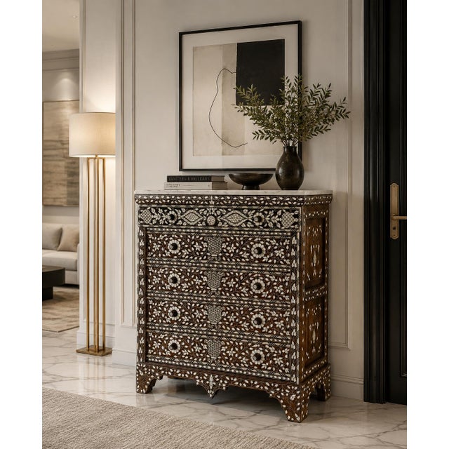 Exotic Handcrafted Mother-of-Pearl Inlaid Chest of Drawers with Marble Top An exceptional mid-19th century chest of...