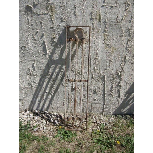 This antique Victorian iron gate is a wonderful piece of architecture. Heavy, tight and sturdy. Piece does show signs of...