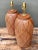 This pair of vintage ceramic table lamps embodies the confident, tactile spirit of Mid-Century Modern design, dating to...