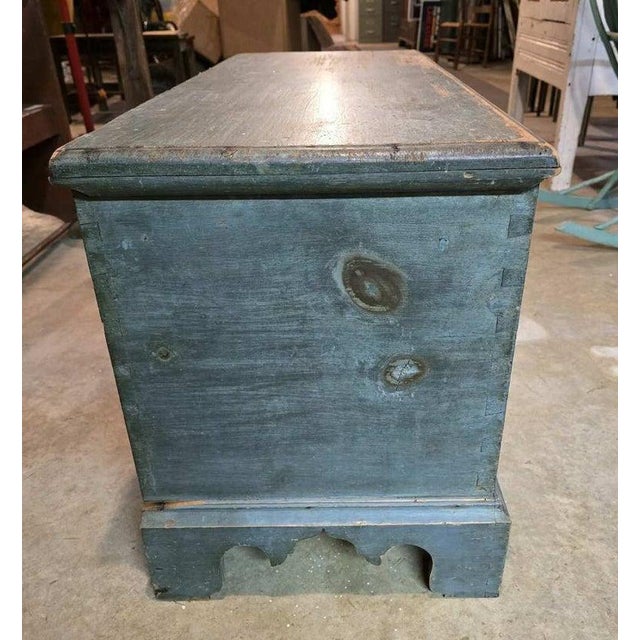 18Thc Original blue painted dovetailed blanket chest from New England and has original bracket feet.The condition is very...