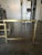 Charming Vintage Mid Century Modern Glass nesting tables. A larger table nest two smaller square tables. Decorative...