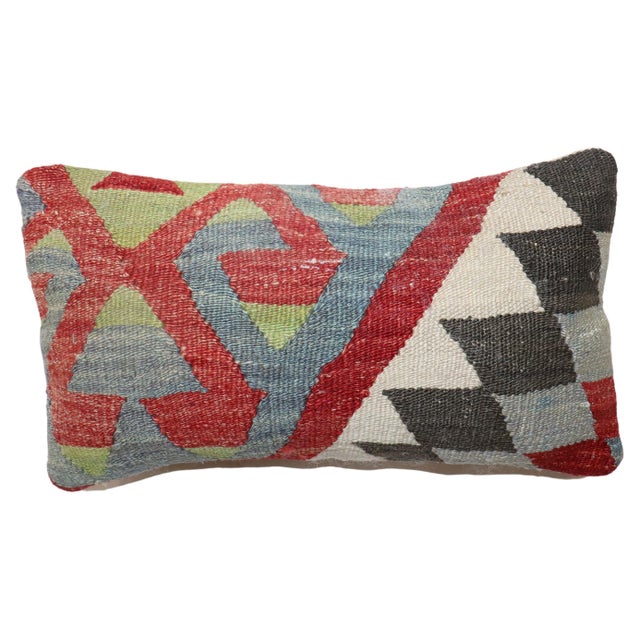 Small size pillow made from an antique Turkish Kilim flat-weave. Measures: 9” x 16''.