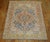 A 20th century Persian Square size bakhtiari rug with a elegant medallion border design in feminine colors.