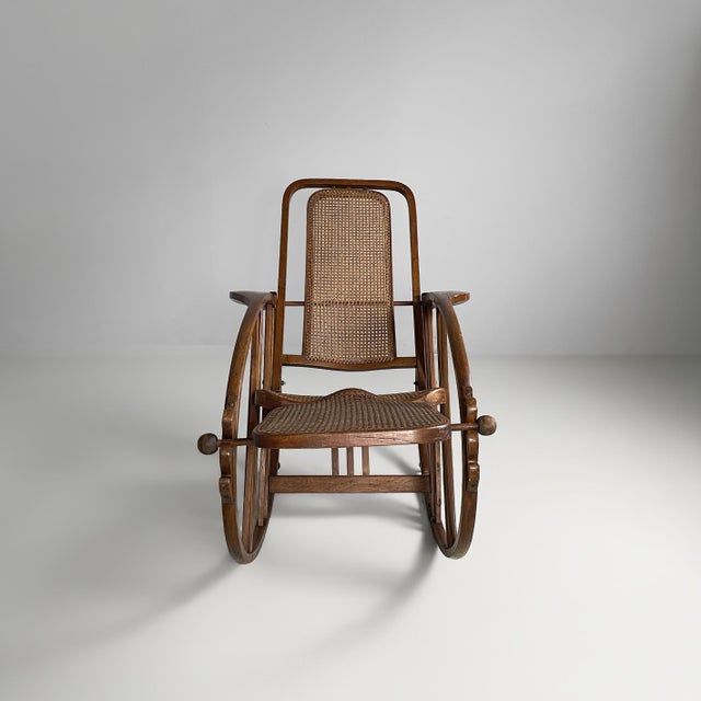 Italian art nouveau rocking chair 267 by Società Anonima Antonio Volpe, 1920s Rocking chair model 267 in bentwood, with a...