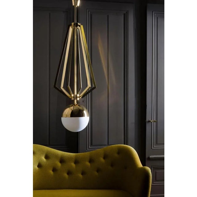Chandelier 10 by magic circus editions dimensions: w 40 x h 120 cm spheres: glass 25 materials: smooth brass, glass all...