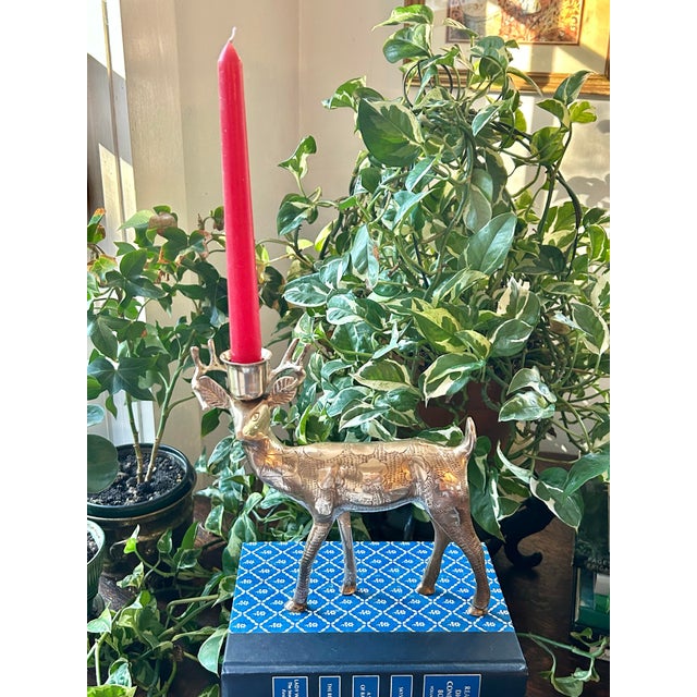 This cast brass candleholder is in the shape of a 10 point buck or maybe a holiday reindeer. We love it for the holidays...