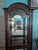USA made Jasper Cabinet Company cherry curio cabinet. Mirrored back with adjustable glass shelves, lockable doors and...