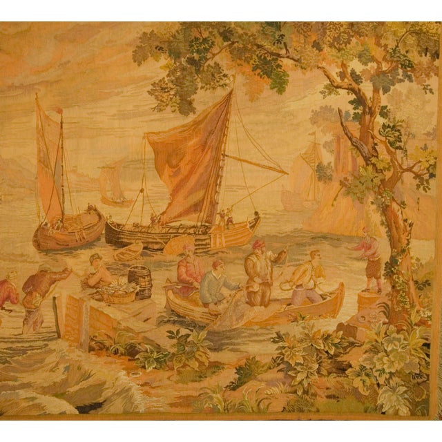 French 19th century hand loomed tapestry. 6'6 x 7'3 wide. An idyllic scene of fisherman and there boats bringing in the...
