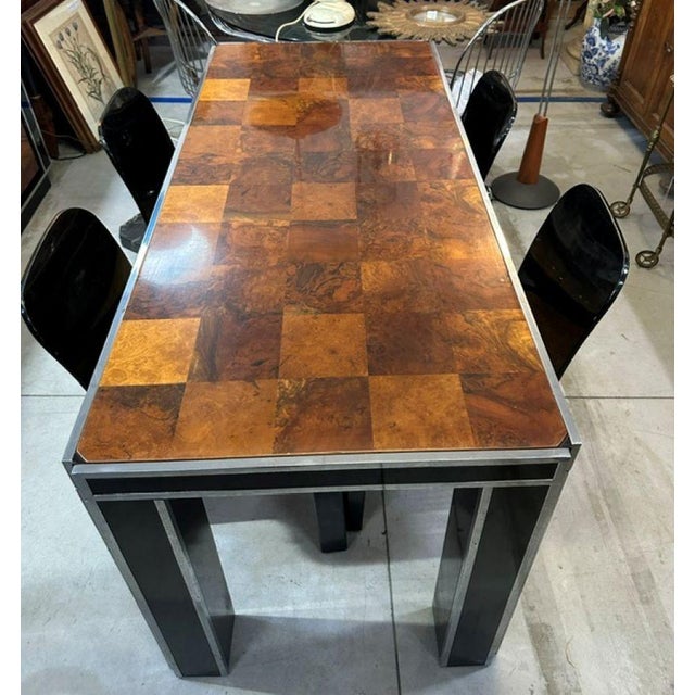Vintage dining table, a piece of Italian design from the 1970s, made of walnut burl with a distinctive checkerboard top...