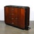 This sensuous Art Deco Walnut &amp; Black Lacquer Curved-Front Cabinet w/ Verde Saint Denis Top originated in France,...