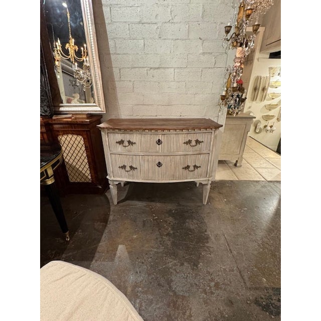These Italian made bedside chests are feature intricate carvings and painted bases, adding a touch of elegance to any...