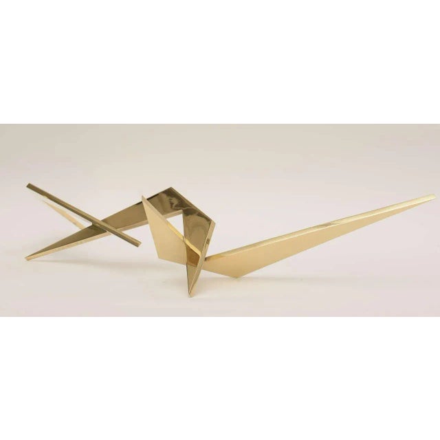 Connected angles, connected points make up this elongated bronze tabletop sculpture signed Larry Mohr. This is abstract in...