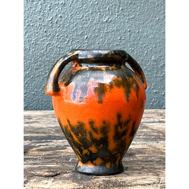 This exquisite miniature ceramic vase is a masterful expression of Mid-Century Modern West German pottery. Its petite...