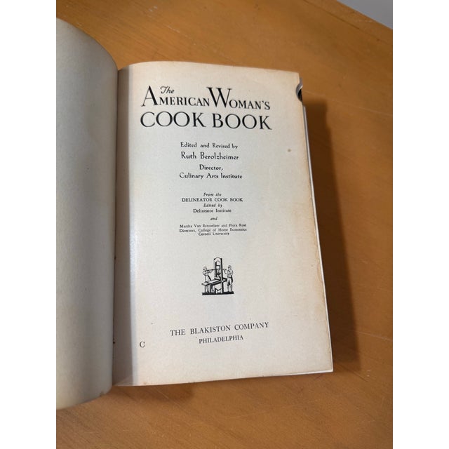 Vintage 1944 Hardcover Edition of "The American Woman's Cook Book" Published in 1944 during World War II, making it a...